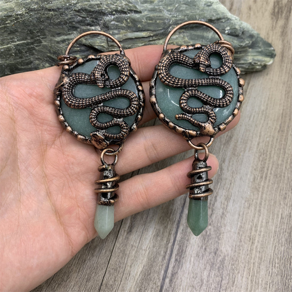ntique copper snake earrings with natural teal crystal disc and green jade point, wire wrapped mystical jewelry