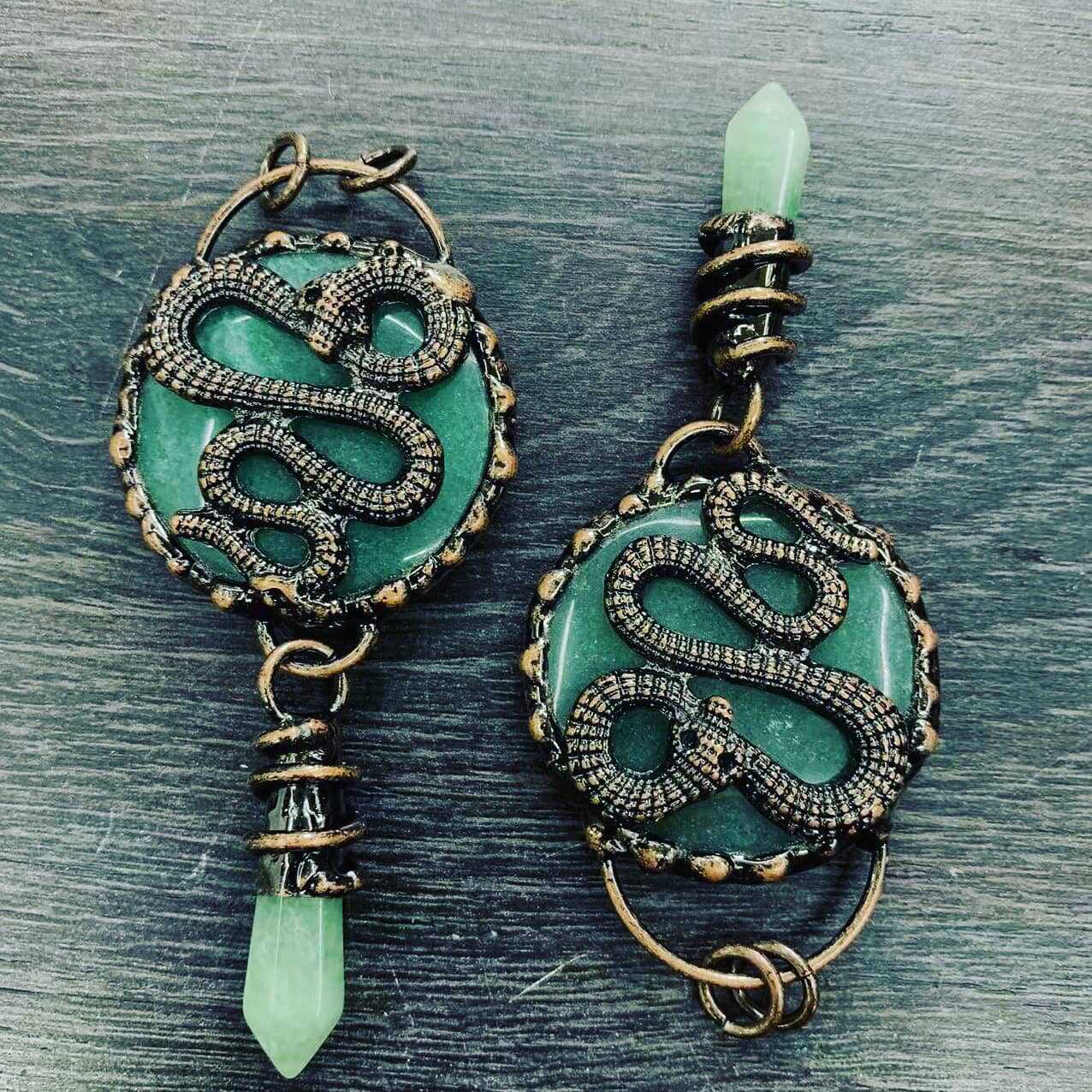 ntique copper snake earrings with natural teal crystal disc and green jade point, wire wrapped mystical jewelry