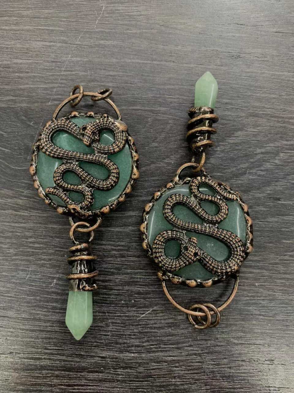 ntique copper snake earrings with natural teal crystal disc and green jade point, wire wrapped mystical jewelry